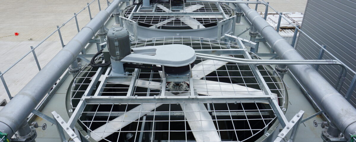 Cooling tower basin with debris buildup
